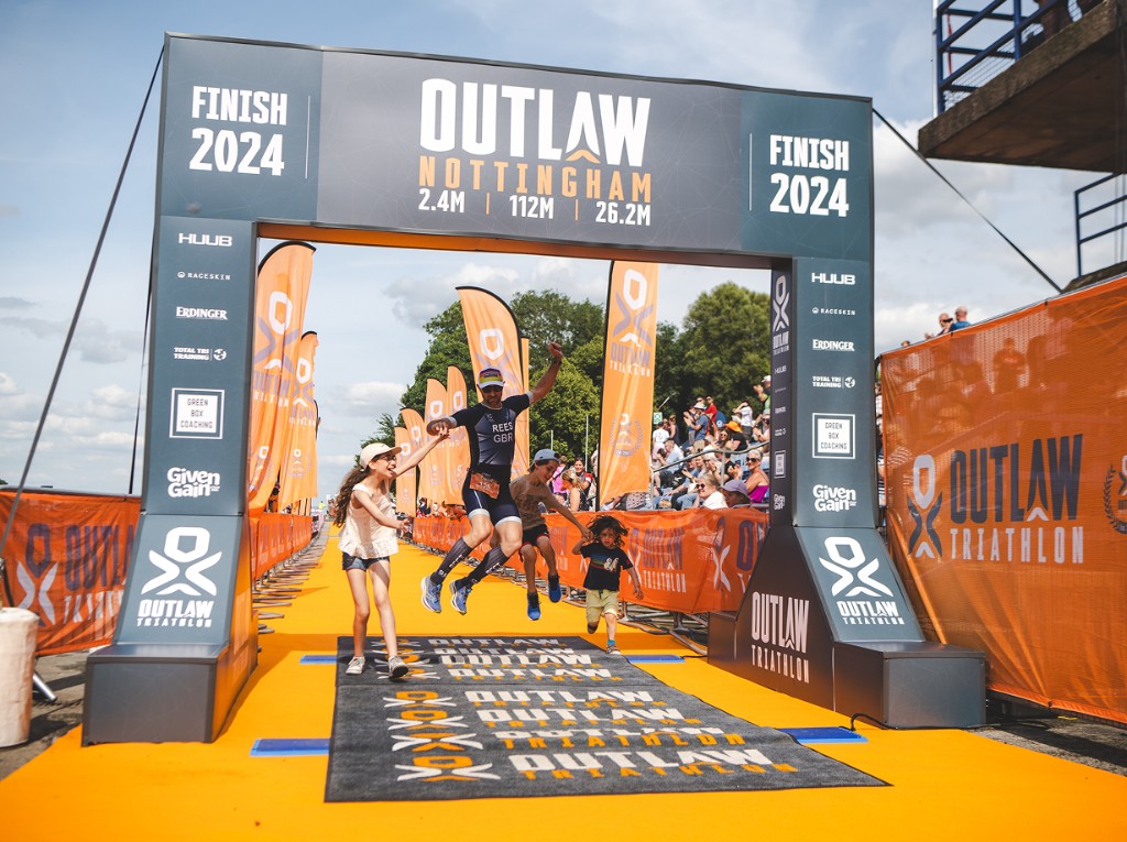 Athlete finishing with family at Outlaw Nottingham