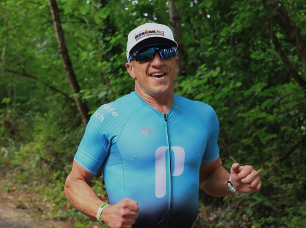 Purple Patch athlete running on a wooded trail