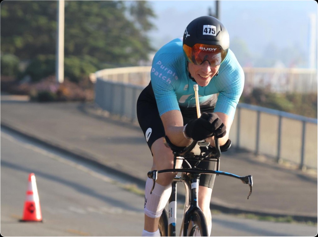 Purple Patch athlete on a triathlon bike